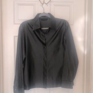 This shirt is stunning 100 % silk , French cuffs , It’s very sophisticated